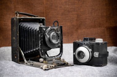 two old cameras, ibsor & agfa clack clipart