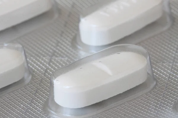 Pílulas Brancas Blister Plástico Fechar — Fotografia de Stock