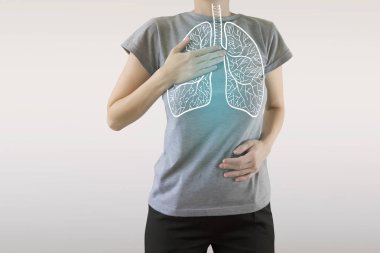 highlighted blue  healthy lungs on woman body / healthy lifestyl clipart