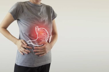 Digital composite of highlighted stomach of woman clipart