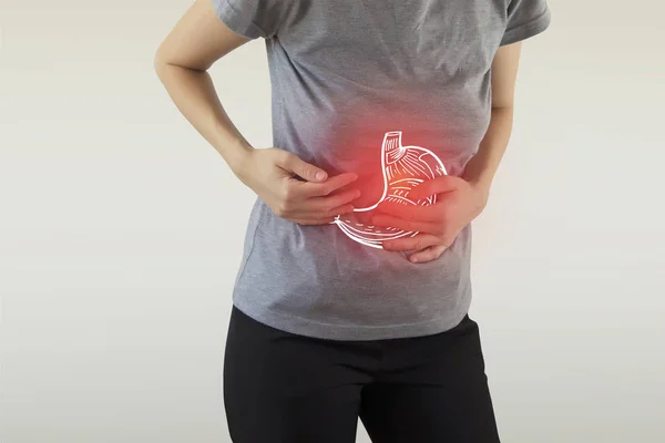 Compuesto digital de estomago resaltado de mujer — Foto de Stock