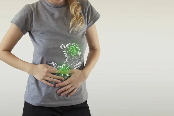Digitaalinen komposiitti korostetun vatsan naisen infektio — kuvapankkivalokuva