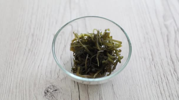 Fresh Seaweed Bowl Mixing Fork Hands Taking Bowl — Stock Video