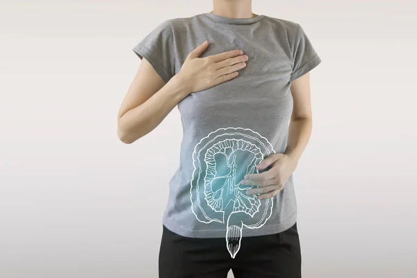 女性の強調された青い健康な腸のデジタルコンポジット — ストック写真