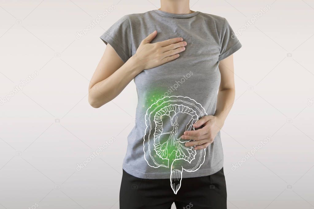 composite image of infected intestine highlighted green on woman
