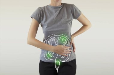 composite image of infected intestine highlighted green on woman clipart