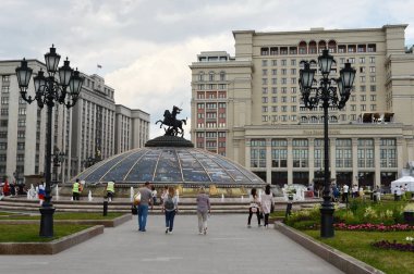 MOSCOW, RUSSIA  JUNE 19, 2018: Manezhnaya square, a view of the State Duma of the Russian Federation and theMOSCOW, RUSSIA  JUNE 19, 2018: Manezhnaya square, a view of the State Duma of the Russian Federation and the hotel `Moscow`. hotel `Moscow`.