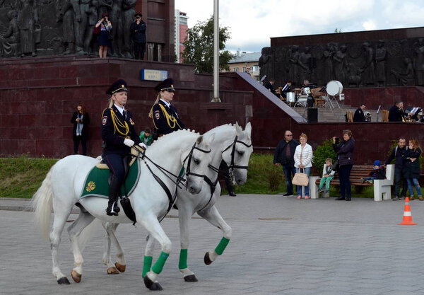  Girls - police cavalrymen demonstrate dressage on the Prospect Mira in Moscow.