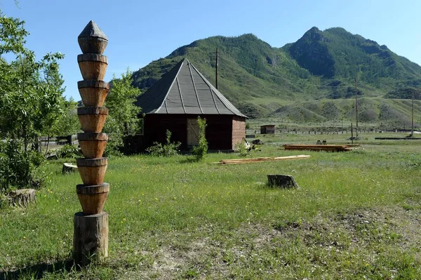 Hitching post. A wooden post for tying the horses. mountain Altai