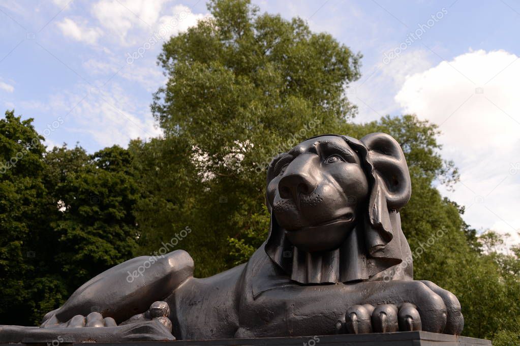 MOSCOW, RUSSIA - JUNE 25, 2018: Sculpture of a lion by Gilardi on the round pier of the Upper Kuzminsky pond in Moscow