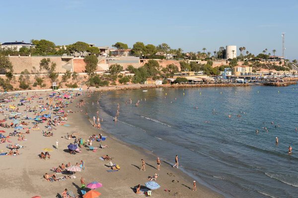 ORIHUELA, COSTA BLANCA, SPAIN - SEPTEMBER 23, 2018:Playa de Cabo Roig beach in Orihuela Costa. Spain