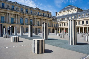 PARIS, FRANCE - MAY 26, 2018: Buren columns, black and white marble plates in the courtyard of the Palace Palais Royal clipart