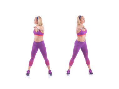 Güzel genç hamile kadın beyaz bir arka plan üzerinde yapıyor. Erken hamilelik.