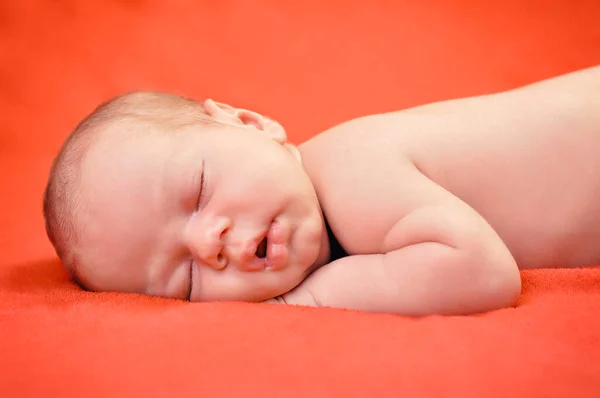 Beautiful Newborn Baby Boy Sleeping Peacefully Soft Red Blanket — Stock Photo, Image