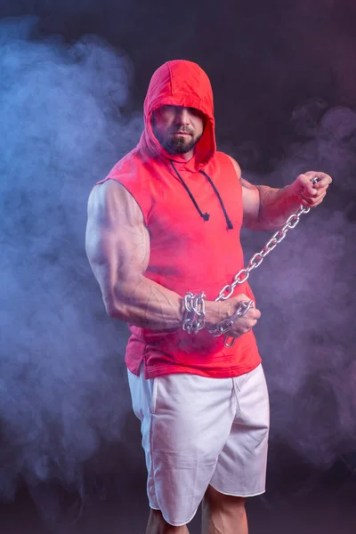 Powerful Muscular Man Hood Chain Posing Red Sweatshirt Studio Shoot — Stock Photo, Image