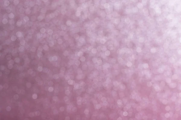 Bokeh defocused ışıklar ile soluk pembe soyut arka plan