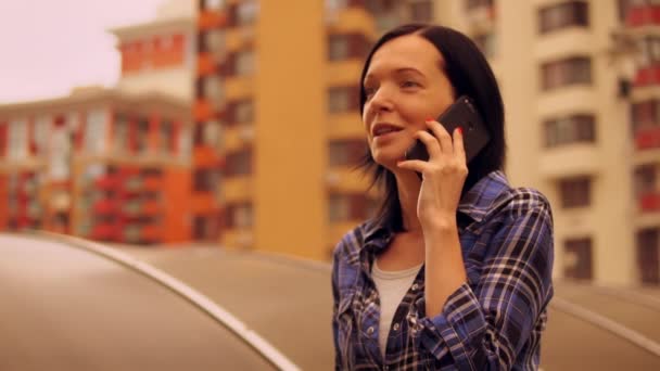 Make-up free woman talking on telephone — Stock Video