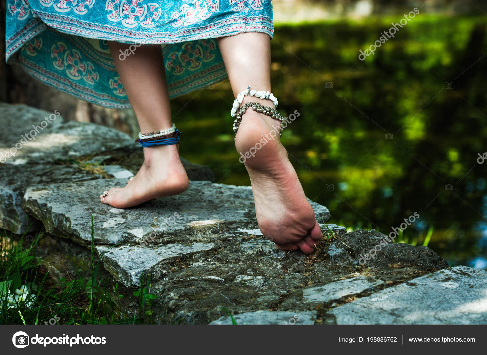 https://st4.depositphotos.com/1016026/19888/i/1600/depositphotos_198886762-stock-photo-barefoot-woman-walk-summer-boho.jpg