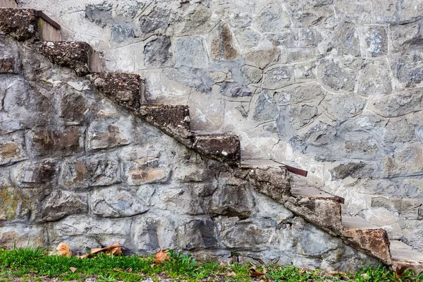 stone stairs on old stone house side view close