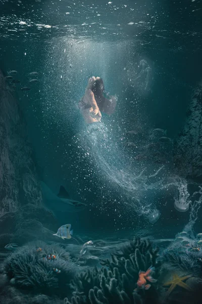 Underwater fantasy scene half woman half jellyfish   swims to th — Stock Photo, Image