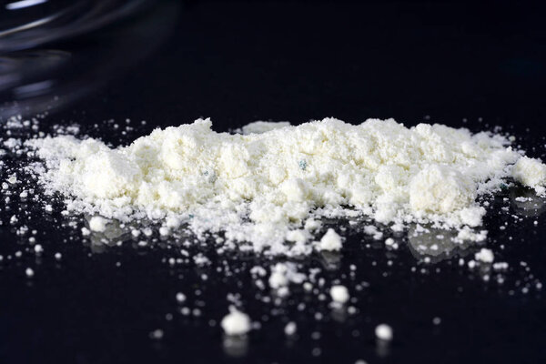 Potassium hexacyanoferrate is used in chemistry lessons to grow red, monoclinic crystals. 