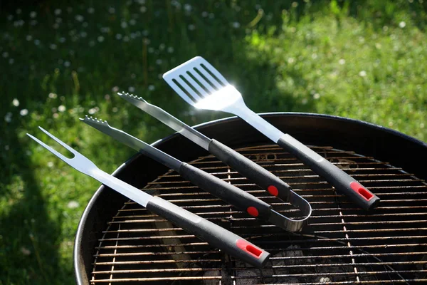 Sausages barbecue with a charcoal barbecue in the garden