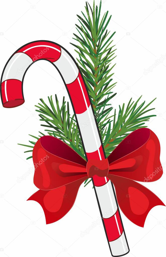 Christmas candy cane with red bow and fir sprigs on white isolated background