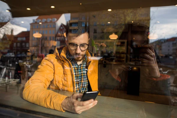 Fashion Guy Glasses Yellow Jacket Sitting Cafe Working Phone — Stock Photo, Image