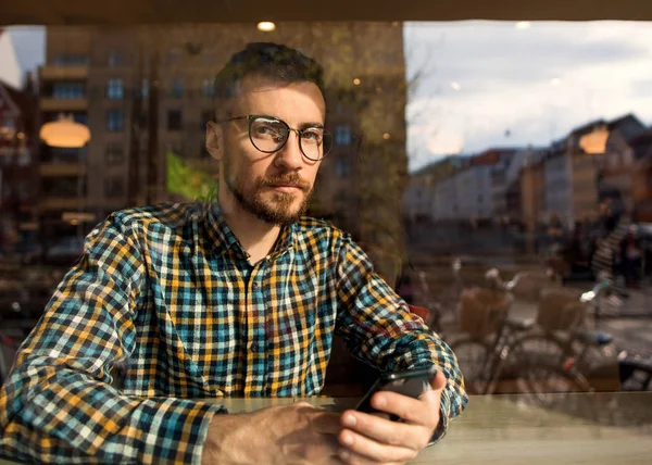 Fashion Guy Glasses Checkered Shirt Sitting Cafe Working Phone — Stock Photo, Image