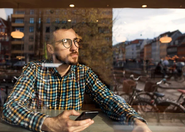 Fashion Guy Glasses Checkered Shirt Sitting Cafe Working Phone — Stock Photo, Image