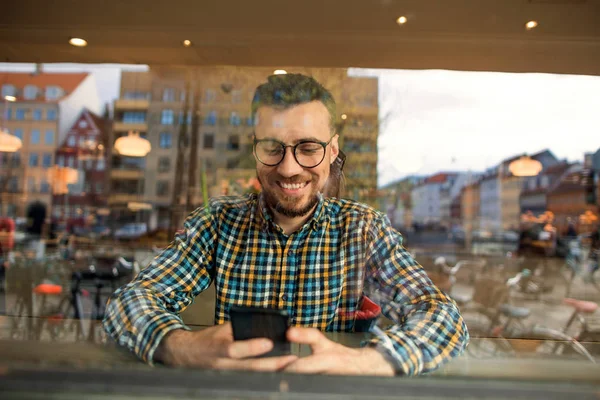 Fashion Guy Glasses Checkered Shirt Sitting Cafe Working Phone — Stock Photo, Image