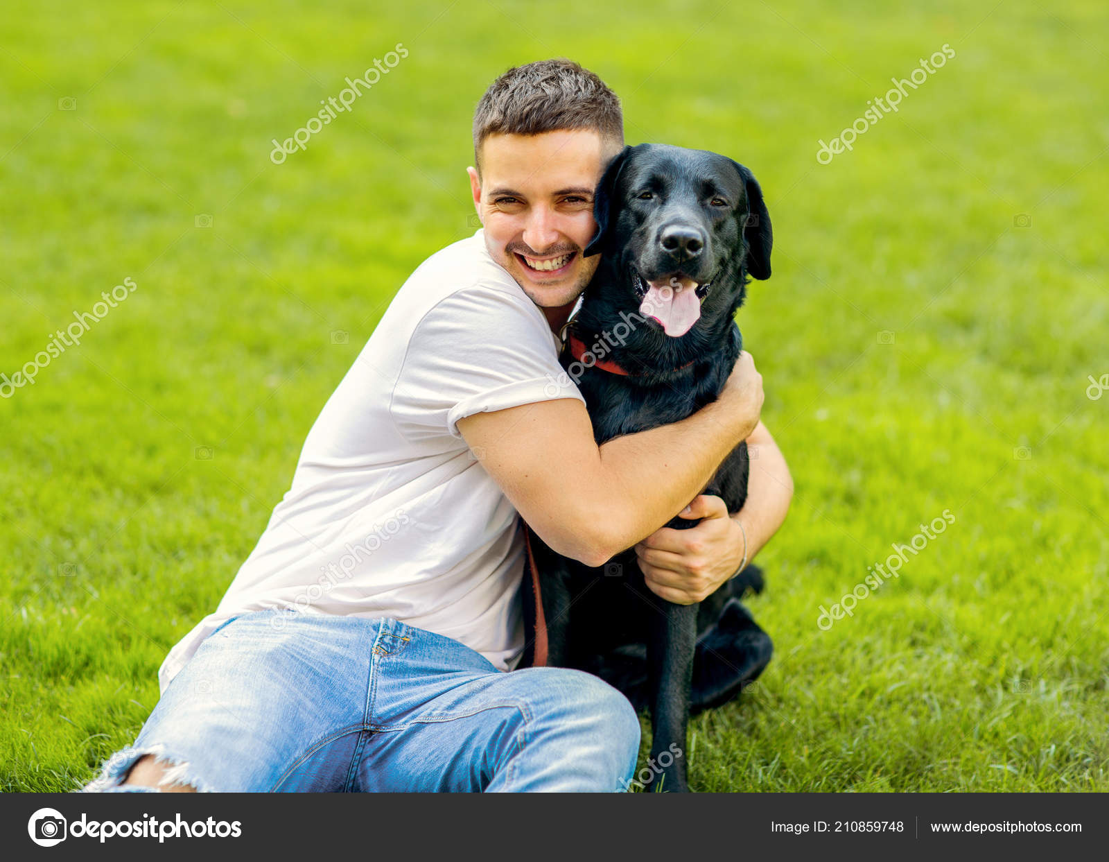 Guy Hugging His Dog Labrador Playing Park — Stock Photo © osons163