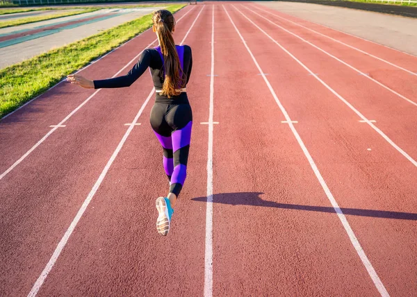 Girl Athlete Runs Stadium Sunset — Stock Photo, Image