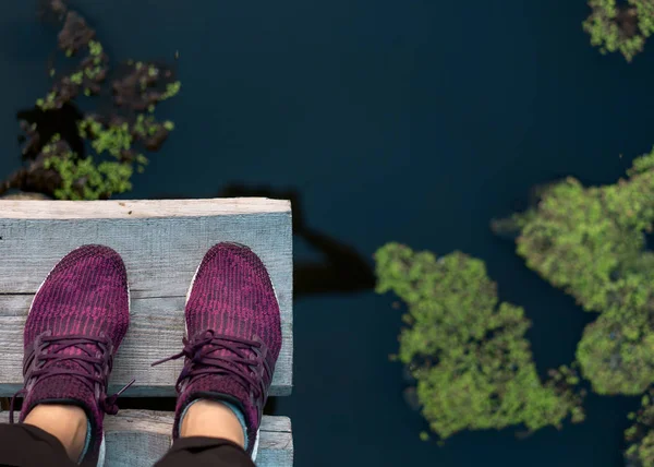 Top view of the river and boots — Stock Photo, Image