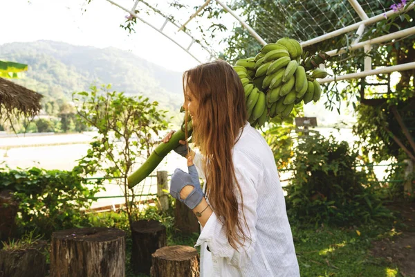 Girl Tropics Holds Branch Bananas Palm Trees Sunset — Stock Photo, Image