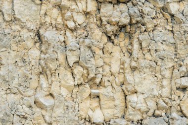 Dokulu taş doğal kaya duvarı formunda moloz balast arka plan