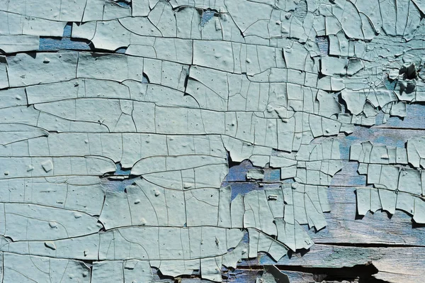 Texturou pozadí popraskané modré barvy na dřevěný povrch — Stock fotografie
