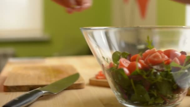 Close Girl Putting Sliced Tomatoes Wooden Table Salad Green Tomatoes — Stock Video