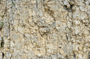 Dokulu taş doğal kaya duvarı formunda moloz balast arka plan