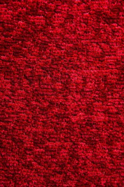 Koyu kırmızı halı doku. Degrade ışık yakın çekim