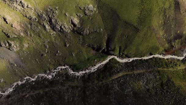 Arial view over the mountain river. Vertical panorama of the rocky wall of the ridge. Flying back from. North Caucasus. Russia — Stock Video