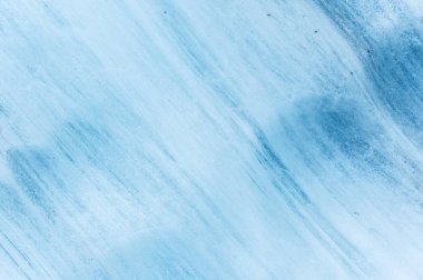 Bir asırlık buzul yakın çekim duvar yapısını çizgili ve kabarcıklar ile. Buz mavisi ışık doku