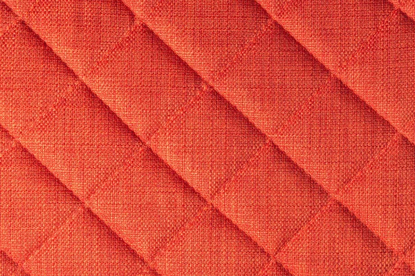 Nahaufnahme Möbelbeschläge - gepolsterte Rückenlehne Sofa. abstraktes rotes Texturdesign — Stockfoto