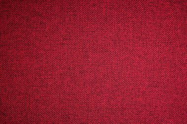 Dokulu arka plan yüzeyi Tekstil döşemelik mobilya yakın çekim. Kırmızı renk kumaş yapısı