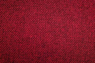 Dokulu arka plan yüzeyi Tekstil döşemelik mobilya yakın çekim. Kırmızı renk kumaş yapısı