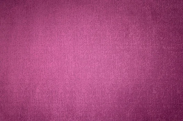 Texturerat bakgrund ytan av textil klädsel möbler närbild. Magenta röd färg tyg struktur — Stockfoto