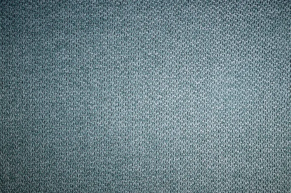 Текстурированная задняя поверхность мягкой мебели крупным планом. серо-голубая ткань — стоковое фото