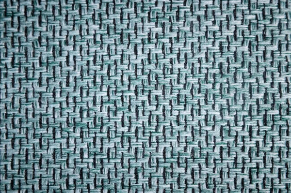 繊維張り家具クローズ アップのバック グラウンド表面をテクスチャしました。青灰色の生地の構造 — ストック写真