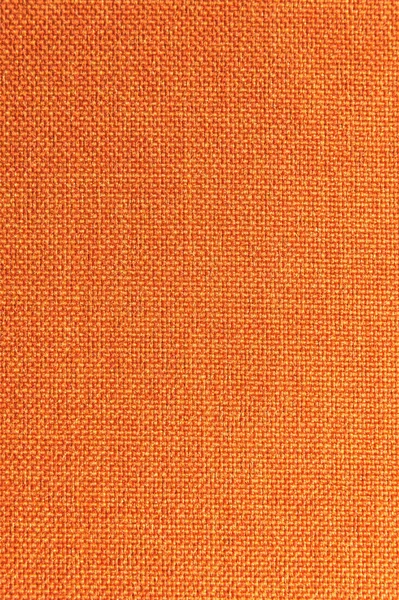 Dokulu arka plan yüzeyi Tekstil döşemelik mobilya yakın çekim. Turuncu renk kumaş yapısı
