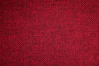 Dokulu arka plan yüzeyi Tekstil döşemelik mobilya yakın çekim. Kırmızı renk kumaş yapısı